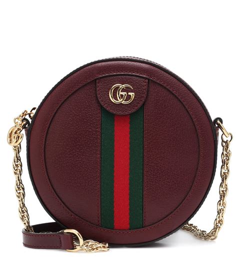 leather purse round disc covered gucci brand|brand new Gucci leather purse.